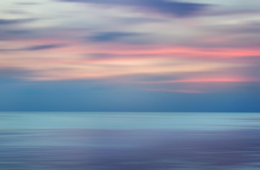 Blurred,Image,Of,A,Sunset,Over,The,Sea,,Background,And